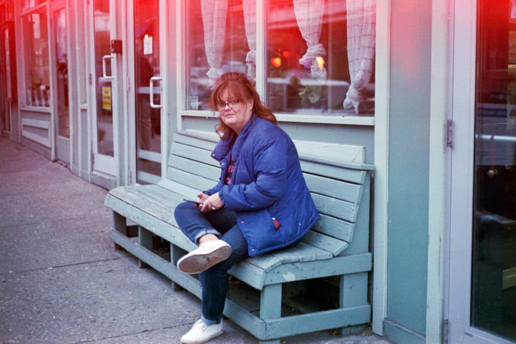 Carol outside the coffee shop.